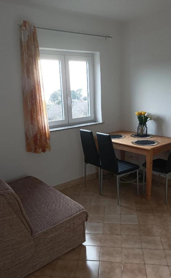 Family Apartments Tomy Punat Bagian luar foto