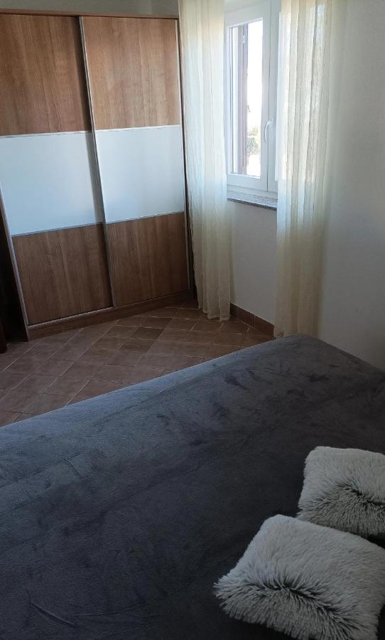 Family Apartments Tomy Punat Bagian luar foto